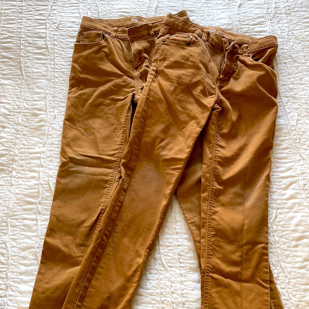 Two pairs of tan pants for boys. Great fit, super comfortable.